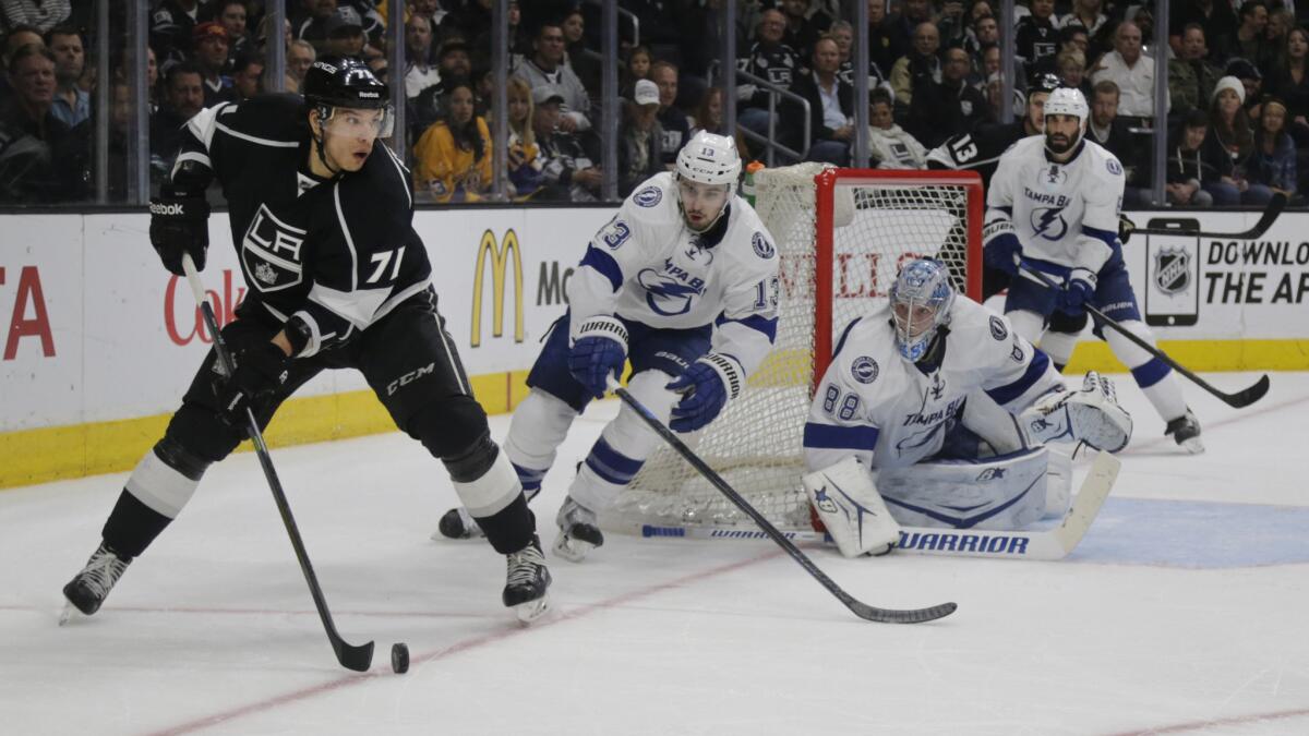 Jordan Nolan looks to pass near the goal during the third period of the Kings' 3-2 win over the Tampa Bay Lightning on Feb. 16.