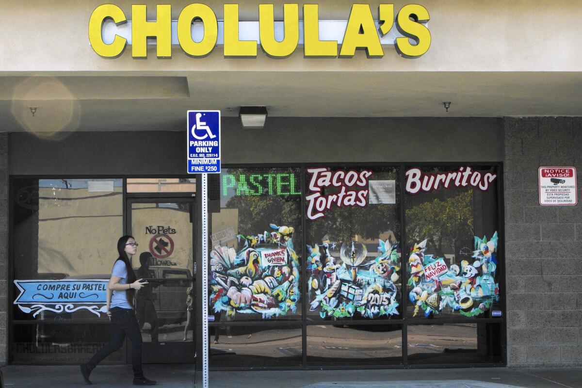 Cholula's Bakery in Santa Ana has been closed and a criminal investigation begun after more than 40 customers were sickened after eating the holiday bread that celebrates the arrival of the Three Wise Men.