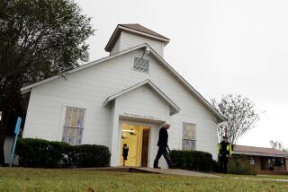 FILE - In this Nov. 12, 2017, file photo, a man walks out of the memorial for the victims of a shooting at Sutherland Springs First Baptist Church in Sutherland Springs, Texas. Donors, survivors and victims' families are questioning how the Texas church is spending millions of dollars of donations made since a gunman killed more than two dozen worshippers in November. (AP Photo/Eric Gay, File)