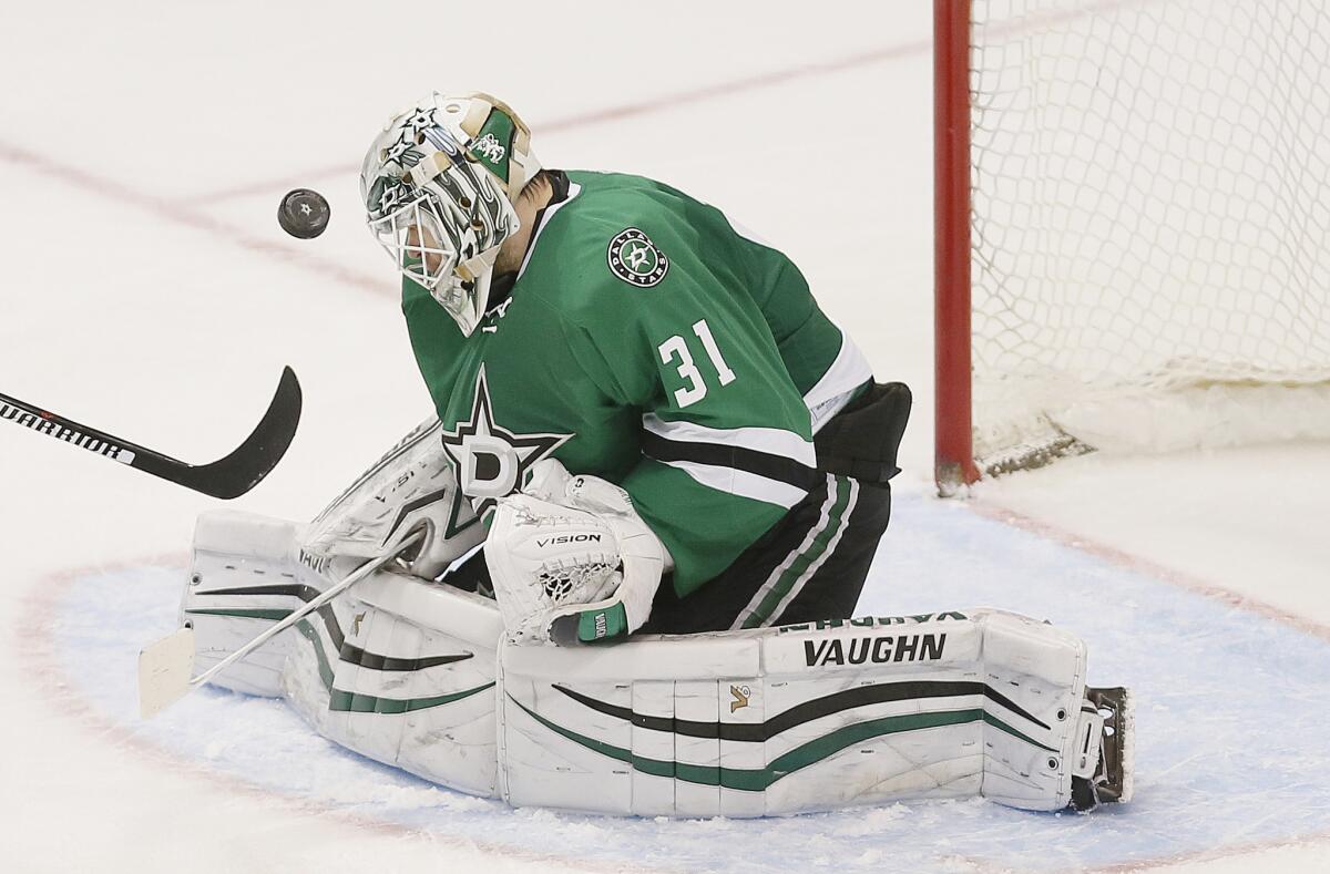 Stars goalie Antti Niemi (31) stops a shot on goal during the third period of a game against the Blues on Mar. 12.
