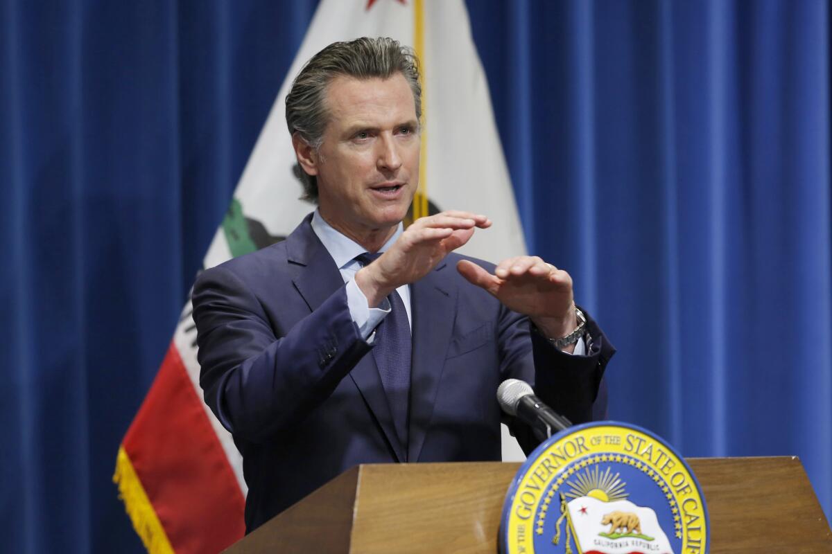 Gov. Gavin Newsom speaks at a May news conference.