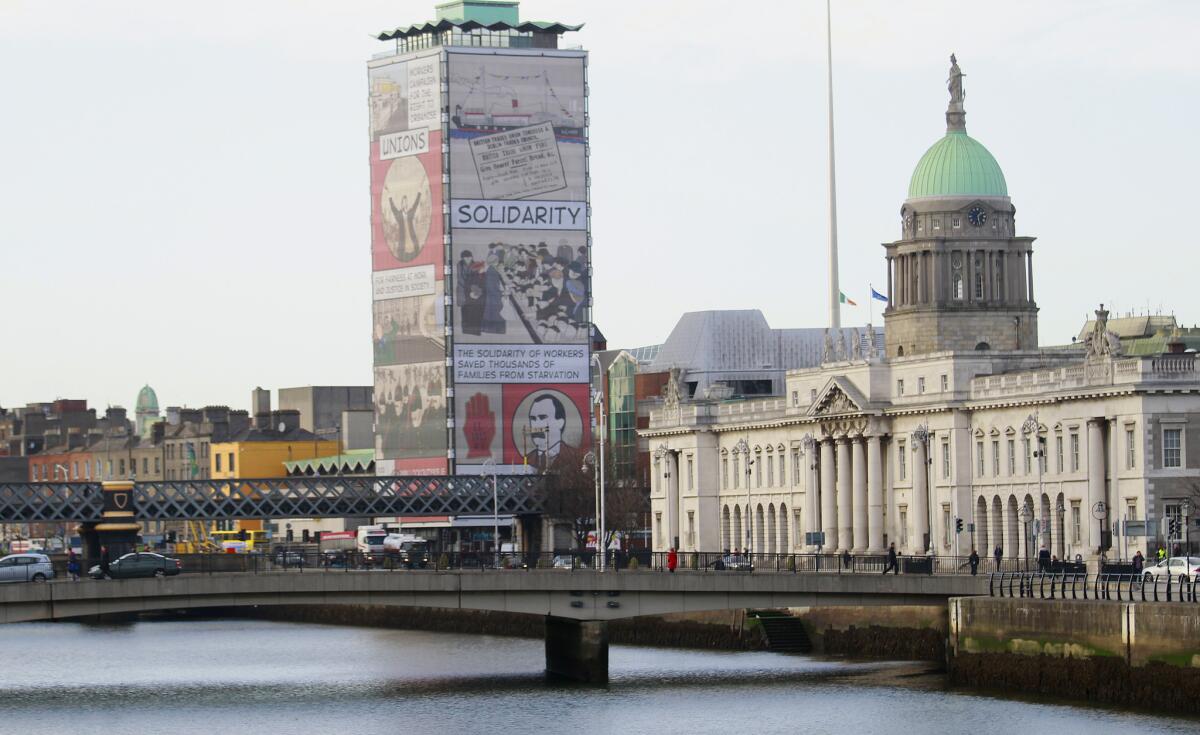 A general view of the customs house building and the River Liffey in the center of Dublin, on Friday. Ireland officially ends its reliance on a bailout program Sunday.
