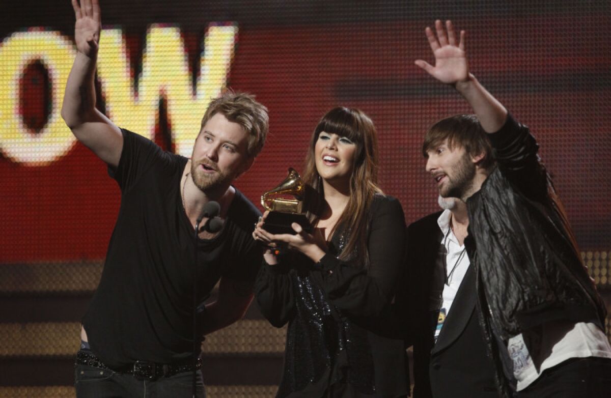 Lady Antebellum accepts a Grammy award. 