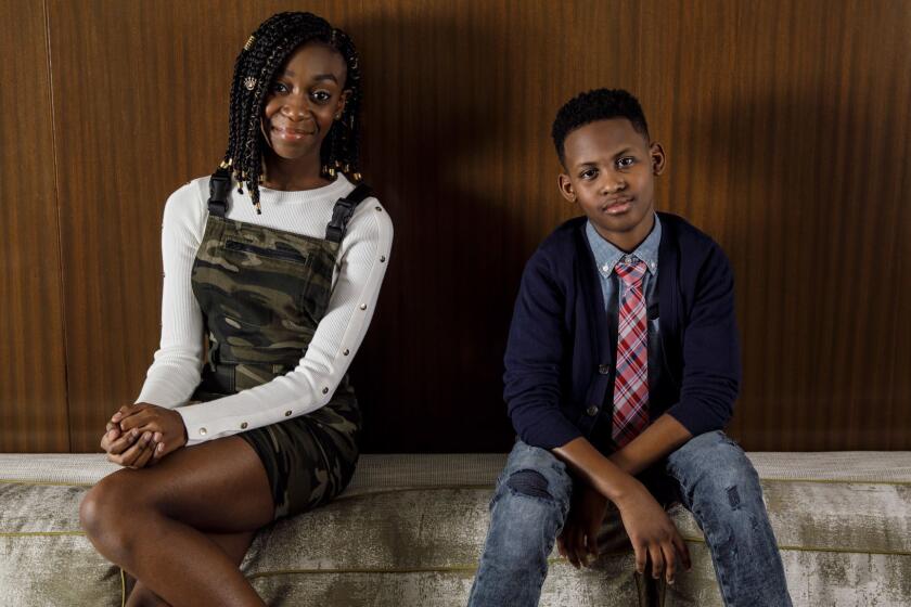 WEST HOLLYWOOD, CALIF. -- MONDAY, MARCH 11, 2019: Shahadi Wright Joseph, left, and Evan Alex, right, pose for a portrait during the promotion of the film, "Us," in West Hollywood, Calif., on March 11, 2019. (Marcus Yam / Los Angeles Times)