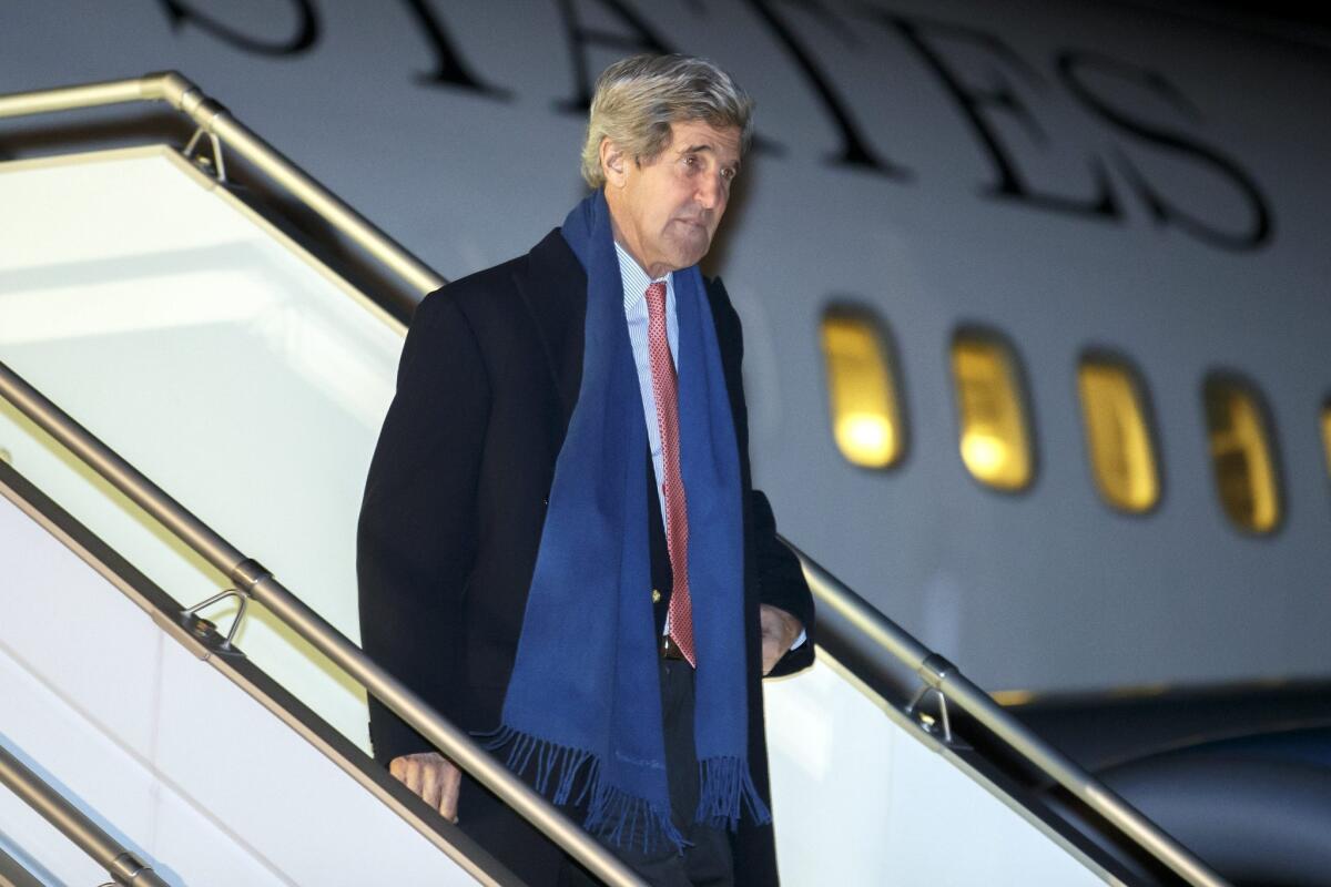 Secretary of State John Kerry arrives at Geneva International Airport ahead of International peace talks.