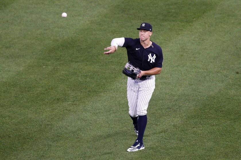 New York Yankees right fielder Aaron Judge throws from the outfield during a pitching change in an intrasquad game Monday, July 6, 2020, at Yankee Stadium in New York. (AP Photo/Kathy Willens)