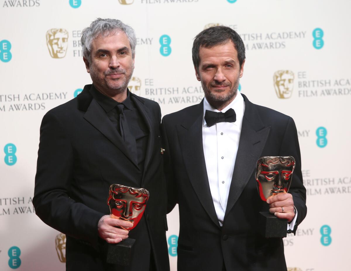 "Gravity" producers Alfonso Cuarón and David Heyman at the British Academy of Film and Television Arts Awards.