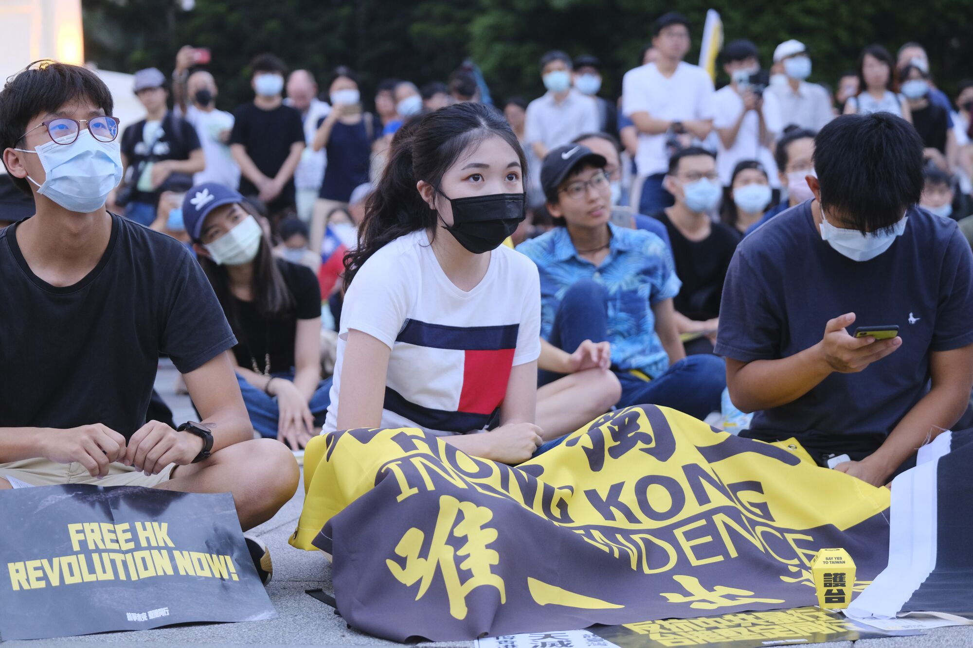 Demonstrators gather in downtown Taipei to protest against China's actions in Hong Kong.
