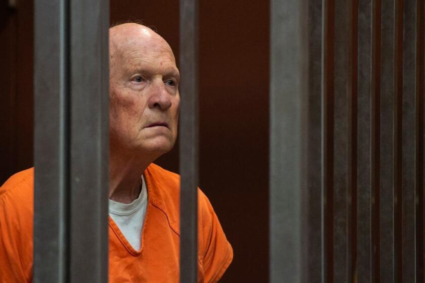 FILE - In this May 29, 2018, file photo, former police officer Joseph DeAngelo, accused of being the Golden State Killer, stands in a Sacramento, Calif., jail court as a judge weighs how much information to release about his arrest. GEDmatch, a popular online genetics database used to find unknown relatives, has tightened its policies for police usage over privacy concerns, after detectives used the site to track down DeAngelo. (Paul Kitagaki Jr./The Sacramento Bee via AP, Pool, File)