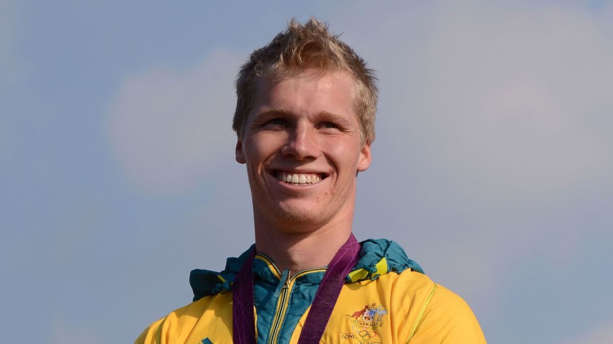 This file photo taken on August 10, 2012 shows Australia's Sam Willoughby standing on the podium with his silver medal after the BMX cycling men's final event at the London 2012 Olympic Games.