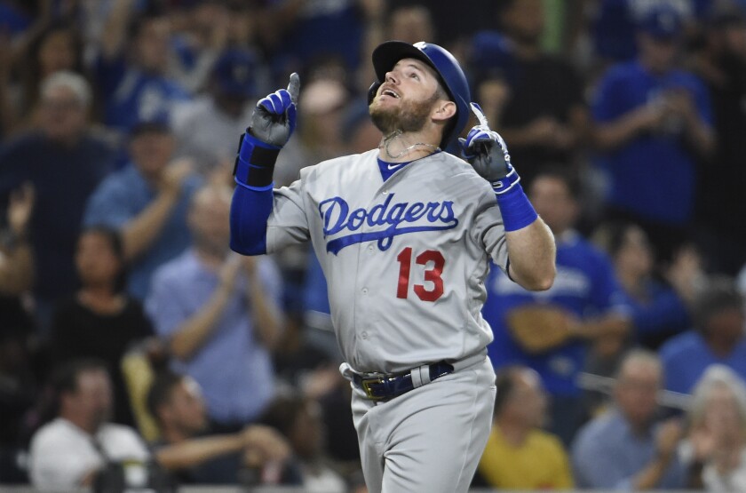 Dodgers first baseman Max Muncy celebrates after hitting a grand slam.