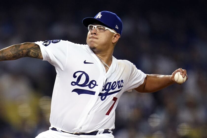 Los Angeles Dodgers starting pitcher Julio Urias throws to the plate during the first inning in Game 1 of a baseball NL Division Series against the San Diego Padres Tuesday, Oct. 11, 2022, in Los Angeles. (AP Photo/Ashley Landis)