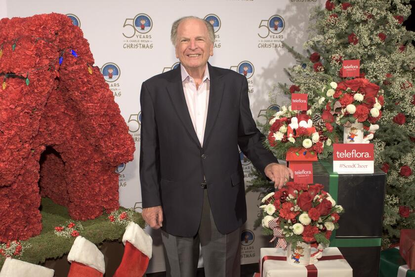 TCA SUMMER PRESS TOUR 2015 - Christmas Coffee Break - Celebrating the 50th anniversary of "A Charlie Brown Christmas" and the new special "It's Your 50th Christmas, Charlie Brown," executive producer Lee Mendelson, pianist David Benoit and Snoopy address the press at Disney | Walt Disney Television via Getty Images Television Group's Summer Press Tour 2015 at The Beverly Hilton in Beverly Hills, California. (Photo by Image Group LA/Walt Disney Television via Getty Images)