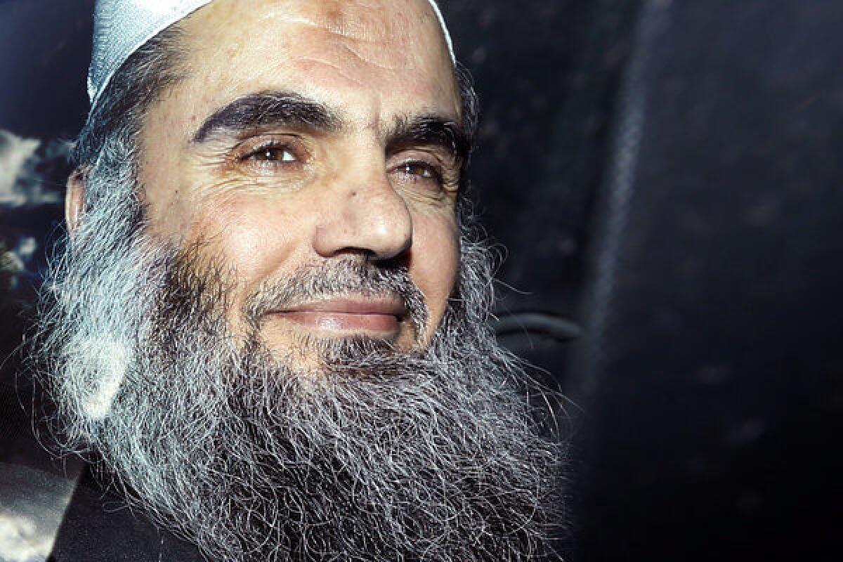 In this Tuesday, April 17, 2012 file photo, Abu Qatada is driven away from a hearing at London's Special Immigration Appeals Commission in London.