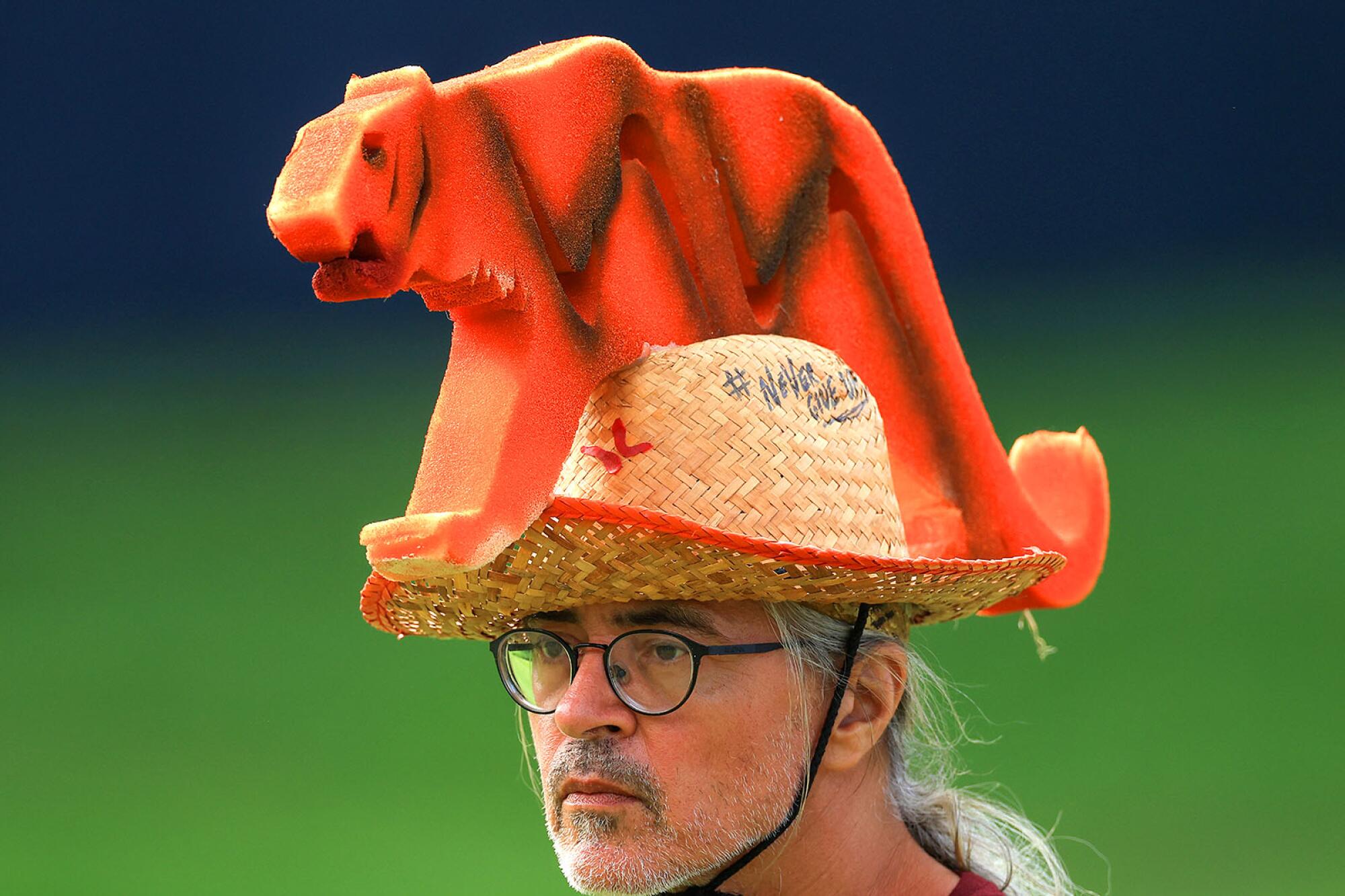 A Tiger Woods fan shows off his homemade Tiger hat during the first round of the PGA Championship.