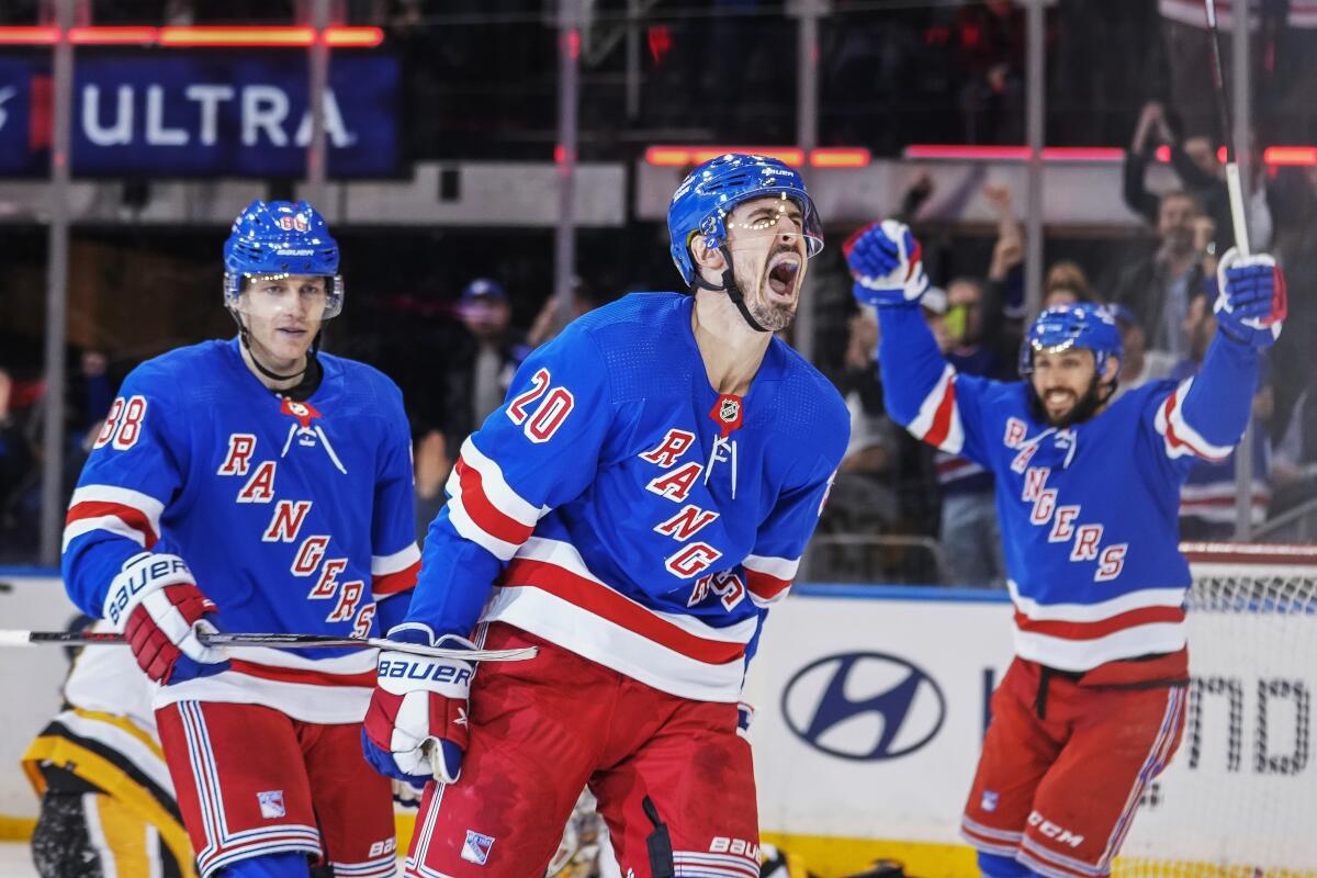 New York Rangers' Chris Kreider (20) celebrates his goal during the third  period in Game 6 of an NHL hockey Stanley Cup first-round playoff series  against the Pittsburgh Penguins in Pittsburgh, Friday