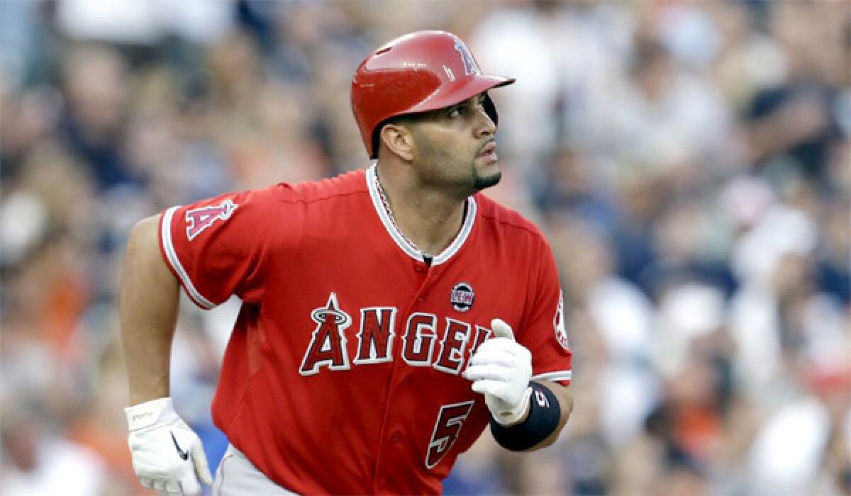 Albert Pujols has been accused of using a false name by an attorney representing Jack Clark, against whom Pujols filed a defamation lawsuit after Clark told a radio show that the Angels slugger used performance-enhancing drugs.