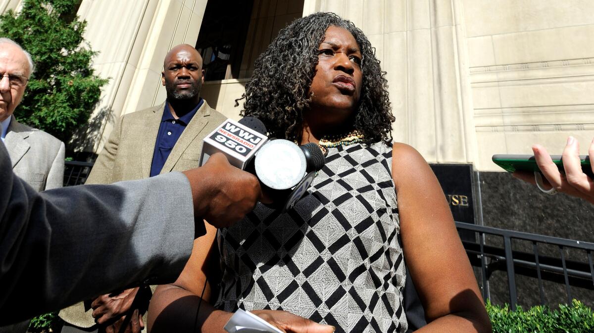 Ivy Bailey of the Detroit Federation of Teachers speaks to media in downtown Detroit on Sept. 13. Bailey was part of a group announcing the filing of a class-action lawsuit which charges that the state of Michigan is denying some children their constitutional right to literacy.