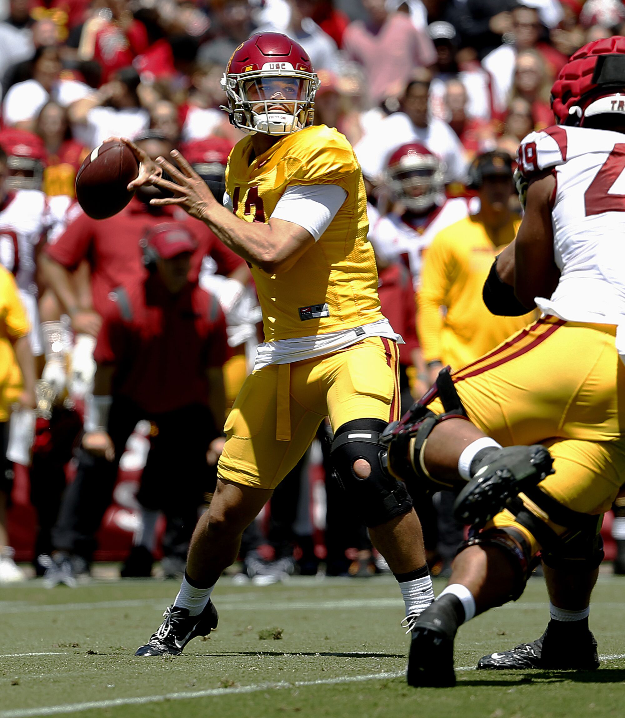 Quarterback Caleb Williams throws a pass.