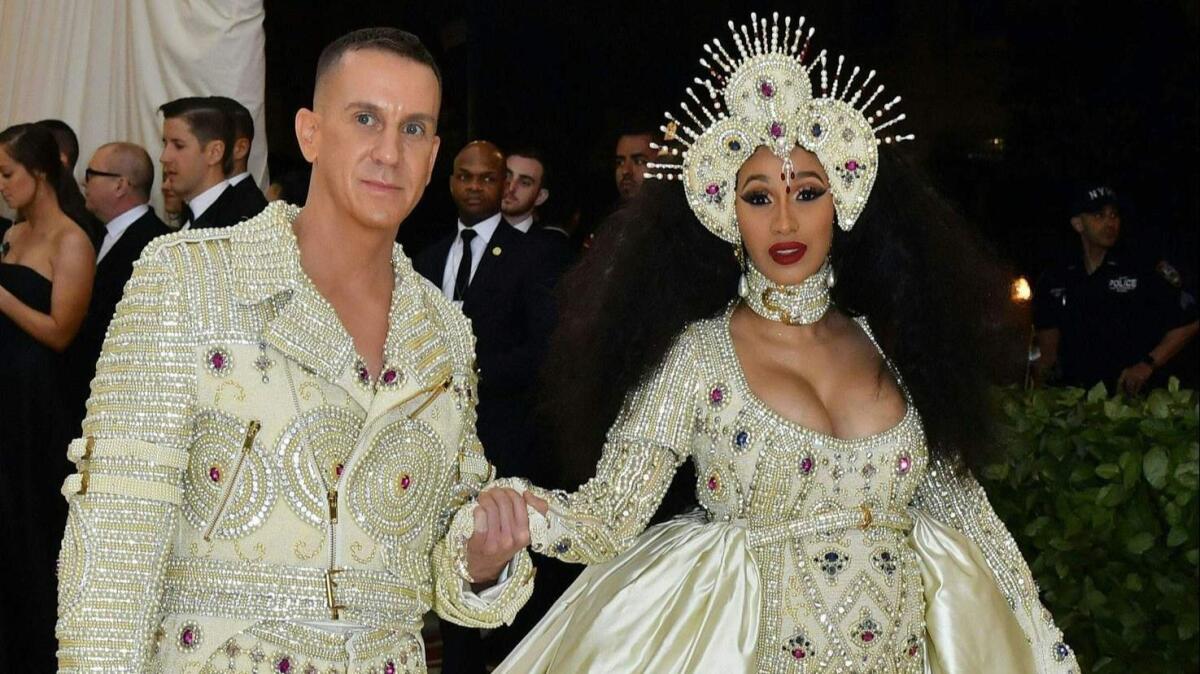 Jeremy Scott and Cardi B arrive at the 2018 Met Gala on Monday at the Metropolitan Museum of Art in New York. The annual gala raises money for the Metropolitan Museum of Art's Costume Institute.