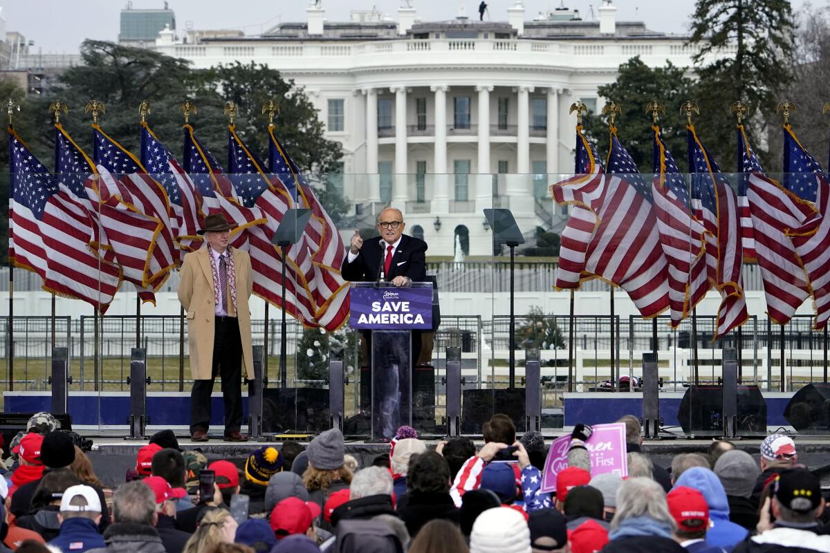 Rudolph W. Giuliani speaks in Washington at a rally with the White House in the background before a mob stormed the Capitol.