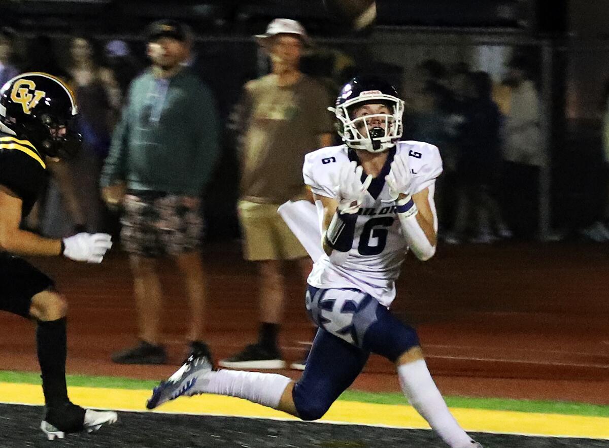 Newport Harbor receiver Kashton Henjum (6) makes a catch for a touchdown in the back of the end zone in the second quarter.