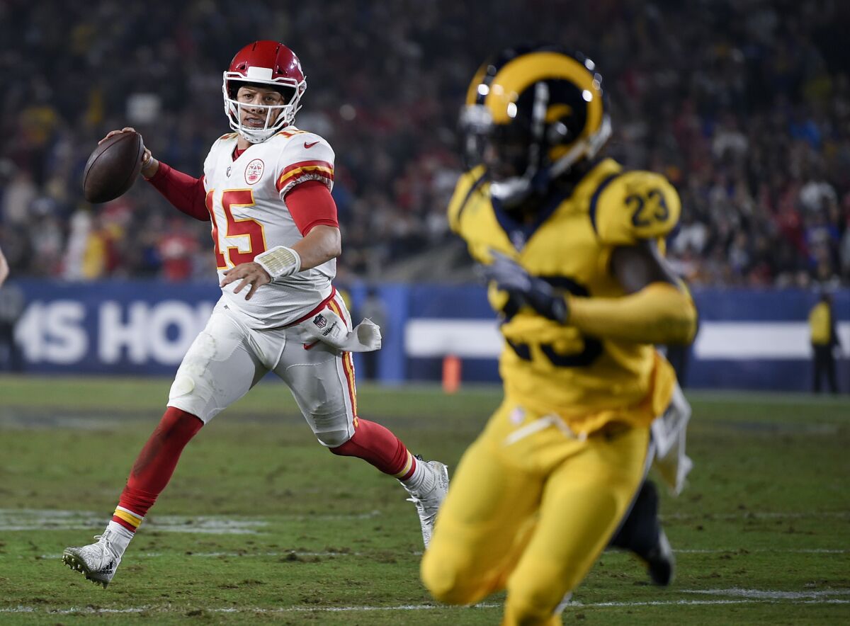Kansas City Chiefs quarterback Patrick Mahomes looks to pass against the Rams in 2018.