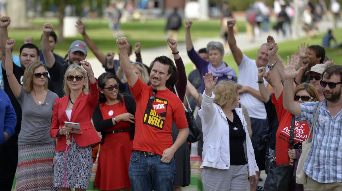 Cal State University faculty members demonstrate after holding a strike vote Oct. 19, 2015, in Long Beach.