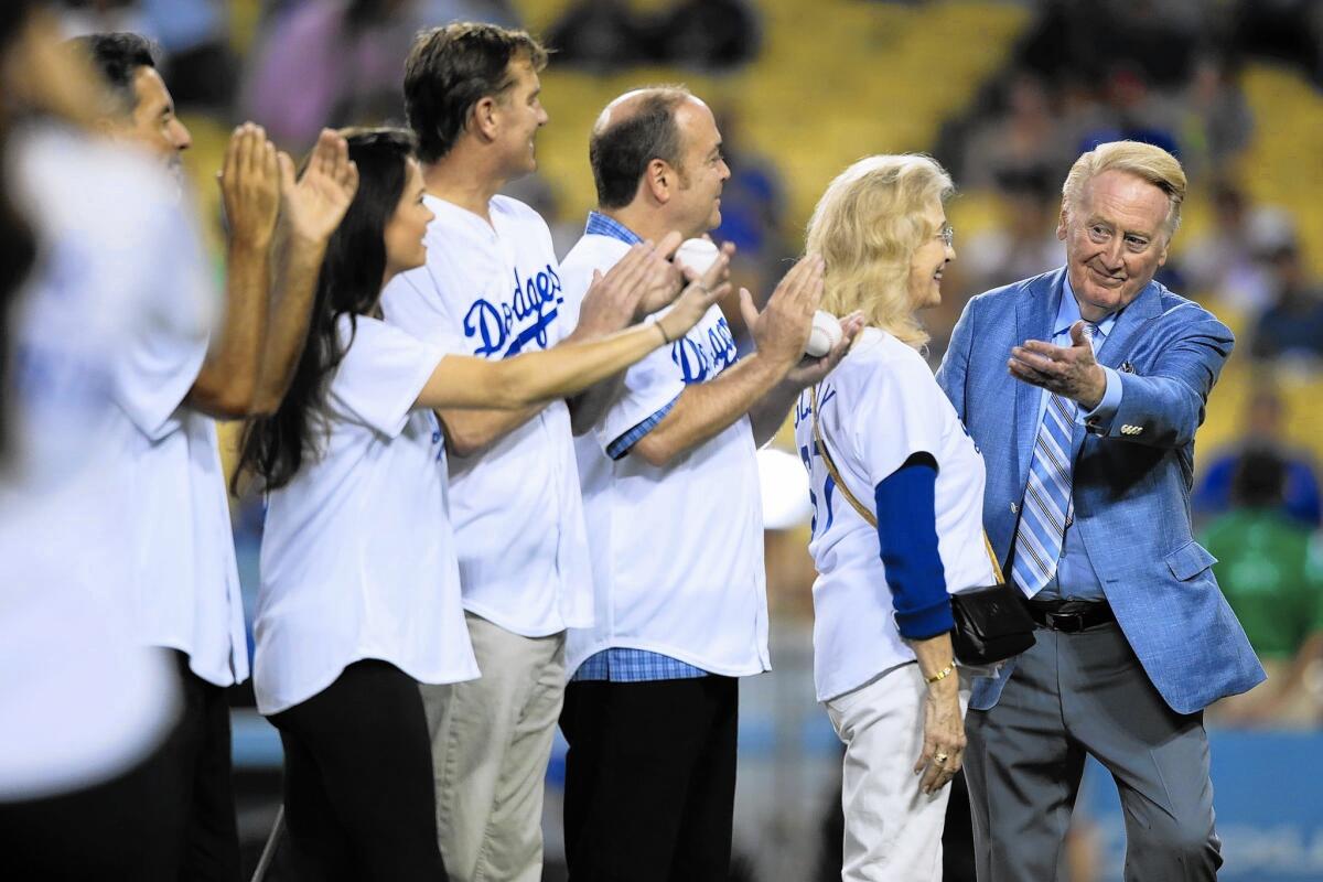 Announcer Vin Scully said Wednesday that he was not entirely comfortable “to have my name tossed into a negotiation.”