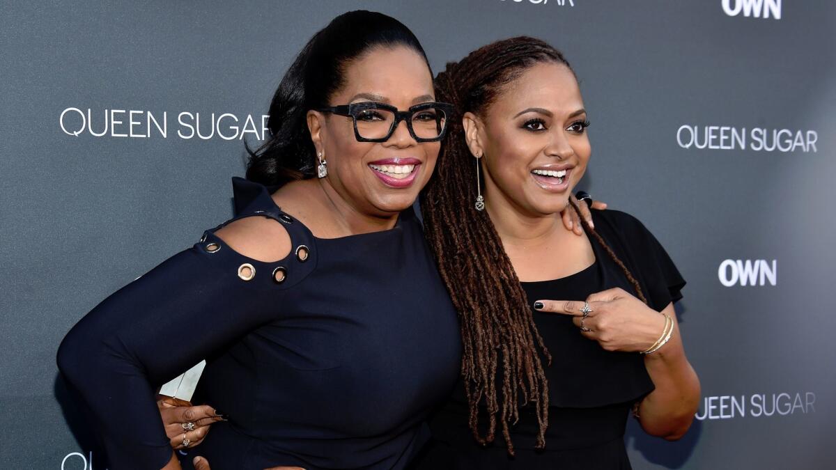 Oprah Winfrey, left, and Ava DuVernay at the Warner Bros. Studio Lot Steven J. Ross Theater on Aug.29, 2016 in Burbank, Calif. (Mike Windle / Getty Images)