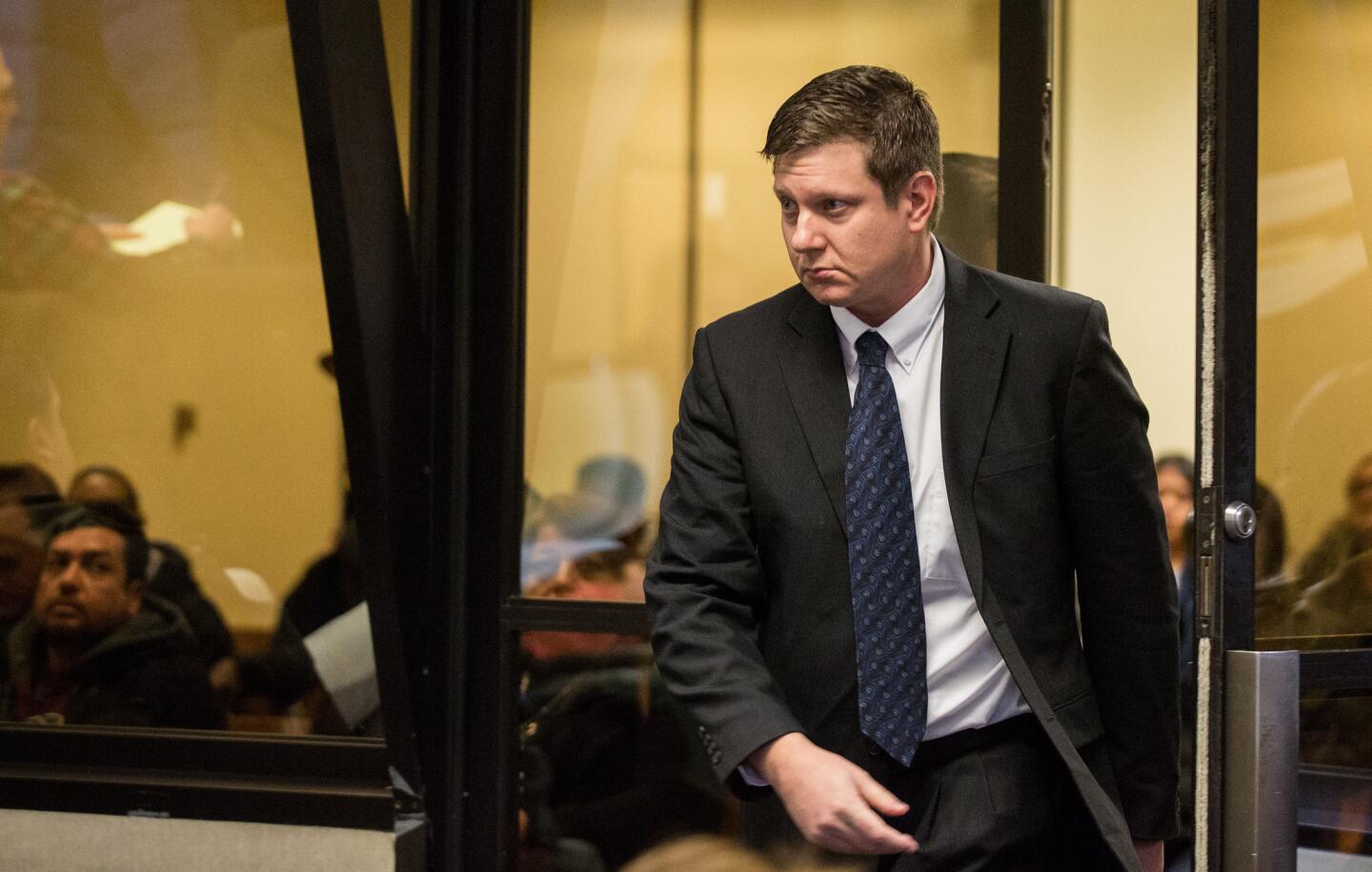Chicago police Officer Jason Van Dyke attends a court hearing with his attorney, Daniel Herbert, at the Leighton Criminal Court Building on Dec. 18, 2015, in Chicago.