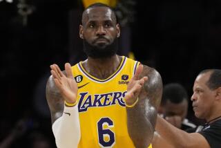 Los Angeles Lakers forward LeBron James (6) reacts after making a shot against the Sacramento Kings.