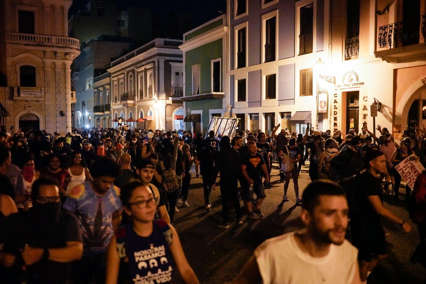 Protesters march in the streets of San Juan, Puerto Rico.