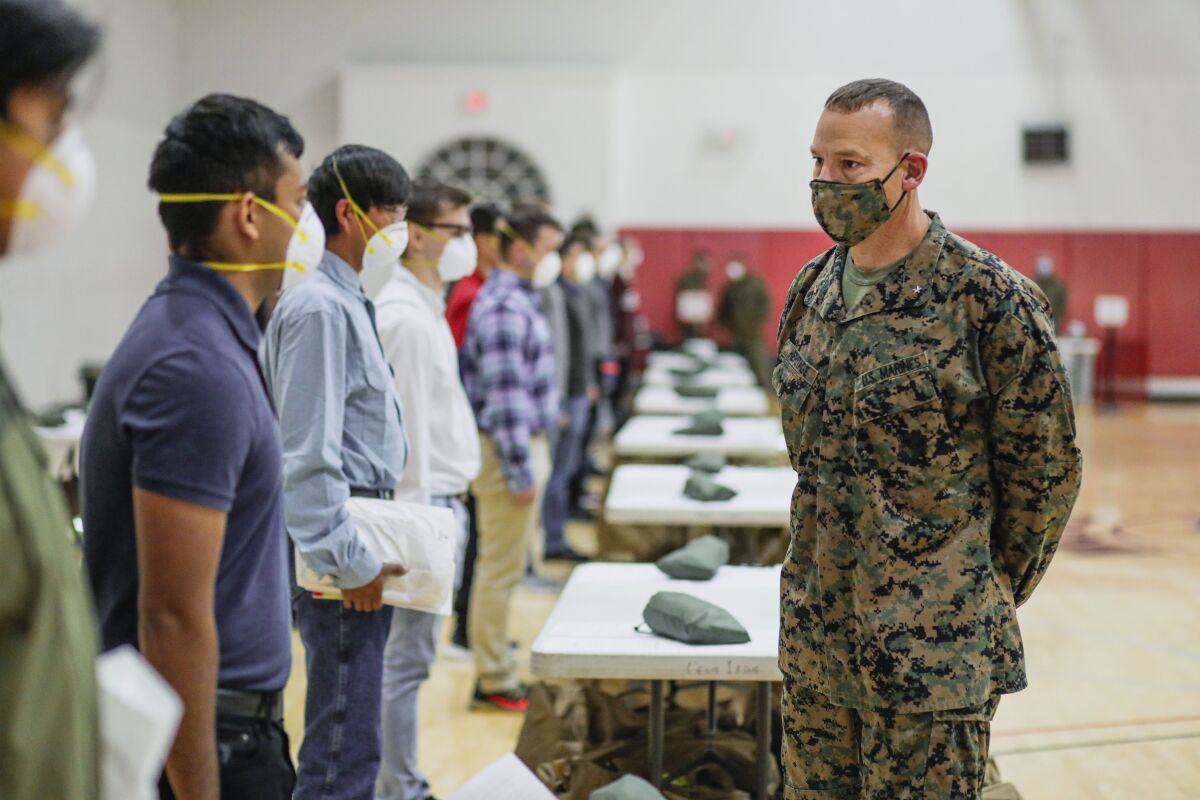 Brig. Gen. Ryan Heritage speaks with marine recruits at the Marine Corp Recruit Depot(MCRD) on Monday. New COVID-19 distancing practices have gone into effect for new recruits, such as standing six feet apart, health screening and a 14-day quarantine period before boot camp begins.
