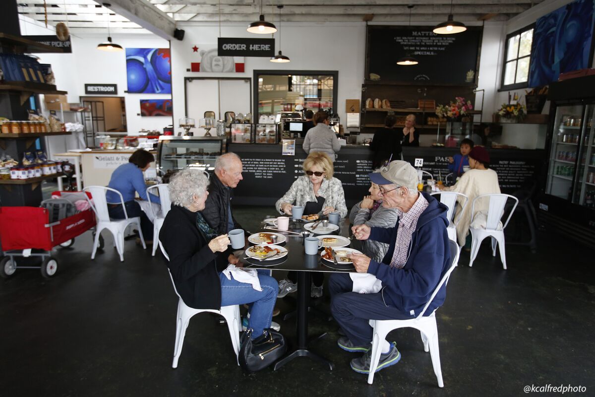 A family of siblings eat at Matteo restaurant in South Park on March 16, 2020. From left to right are, Nancy Abbey, Peter Abbey, Jo Abbey Briggs, Lynne Abbey, and James Abbey.