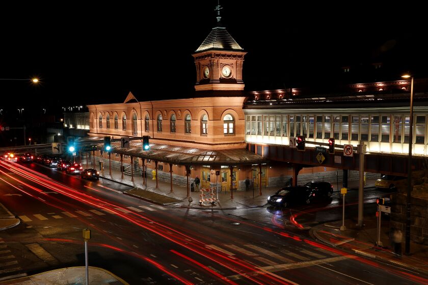 WILMINGTON, DEL. - DEC. 5, 2019. Evening traffic streams past the Joseph R. Biden Jr. Railroad Station in Wilmington, Del. Biden, the 47th vice president of the United States, resides in Wilmington and represented the state in the U.S. Senate from 1973-2009. He regularly took the train from Wilmington to Washington, DC. (Luis Sinco/Los Angeles Times)