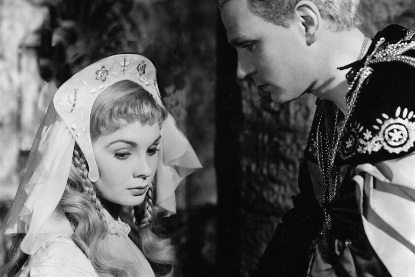 Jean Simmons and Laurence Olivier star in "Hamlet," directed by Olivier, in 1948.