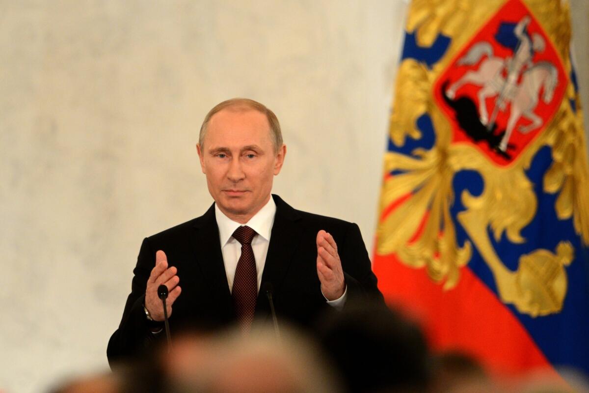 Russia's President Vladimir Putin addresses a joint session of Russian parliament on Crimea in the Kremlin.