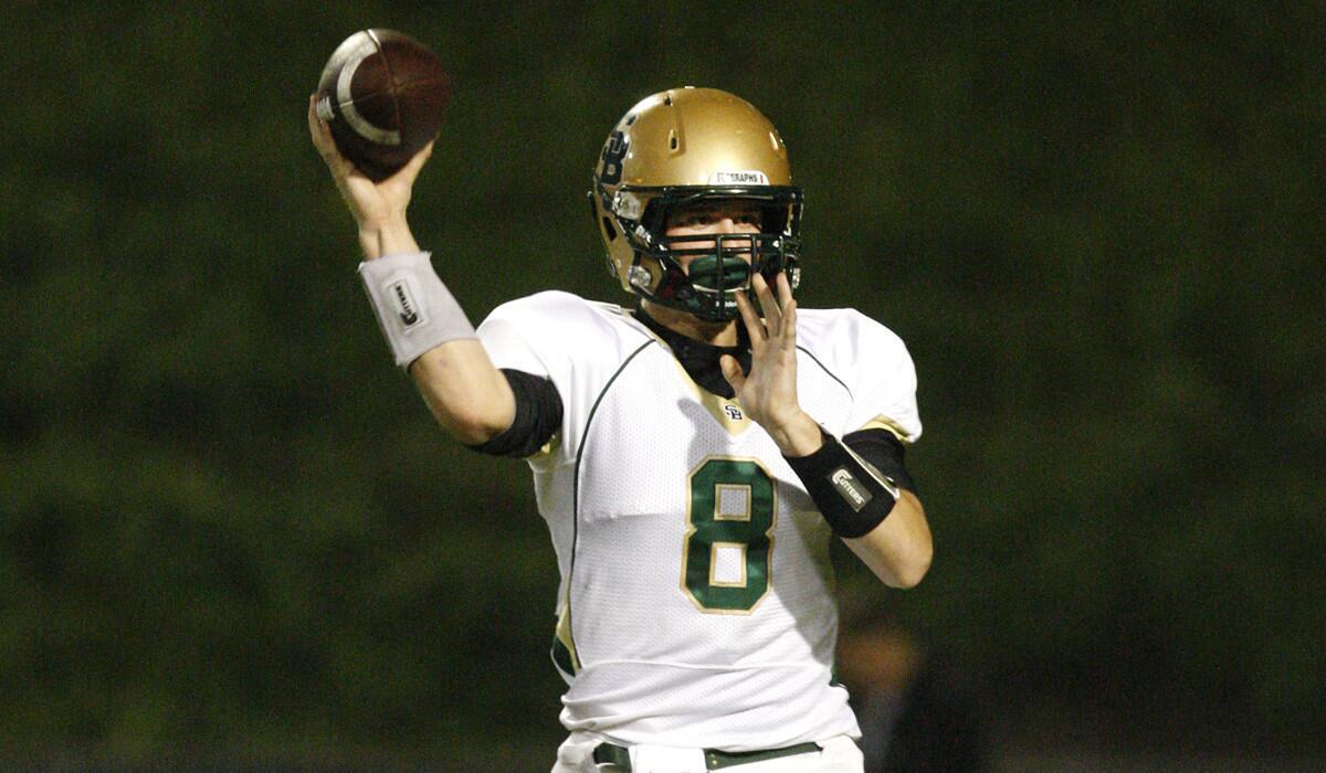 Former Ventura St. Bonaventure High quarterback Ricky Town eyes his receiver against the Rancho Santa Margarita High defense at Saddleback College in Mission Viejo on Sept. 21, 2012.