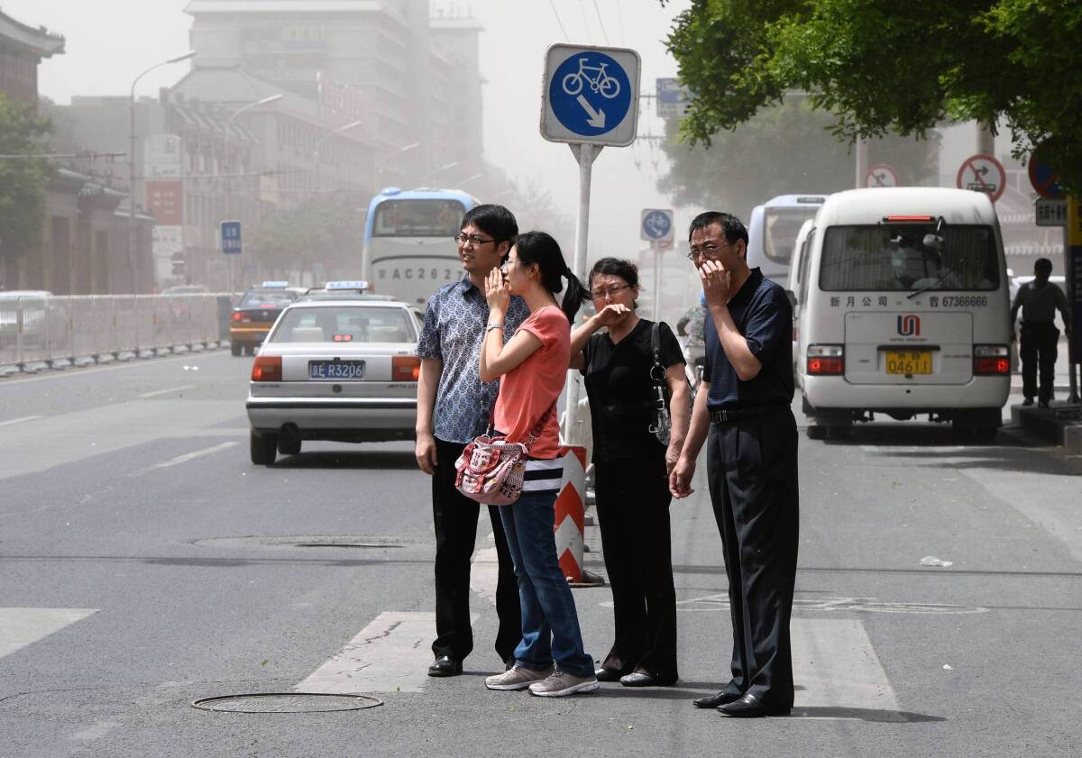 Beijing in May. "I want them to leave before they hate this place," one American executive said of his family's decision to leave pollution-choked Beijing.