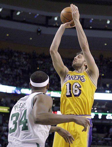 Lakers power forward Pau Gasol, who finished with 20 points and 10 rebounds, puts up a shot over Celtics forward Paul Pierce in the second half Thursday night at TD Garden in Boston.