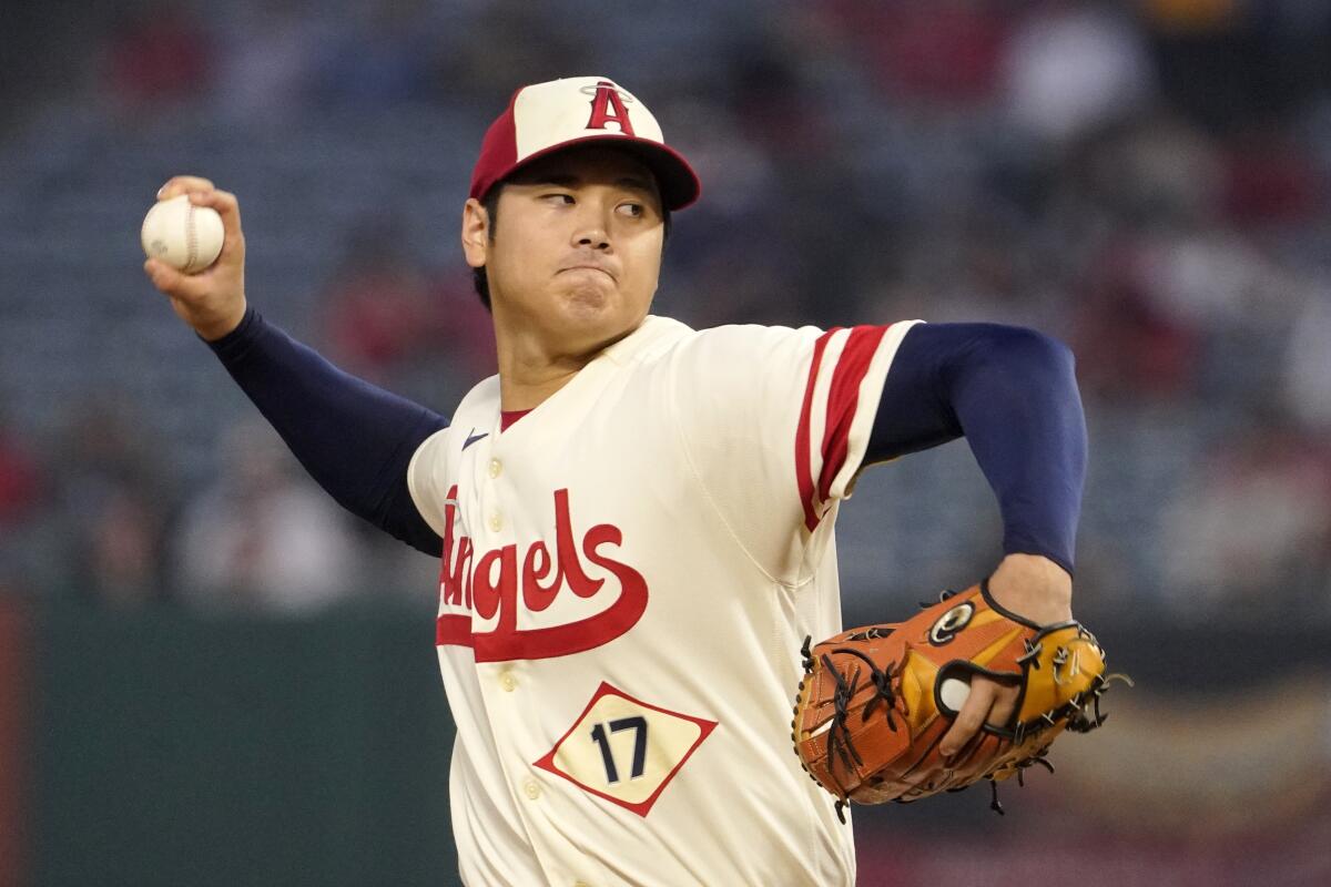 Angels starting pitcher Shohei Ohtani throws to the plate against the Oakland Athletics on Sept. 29.