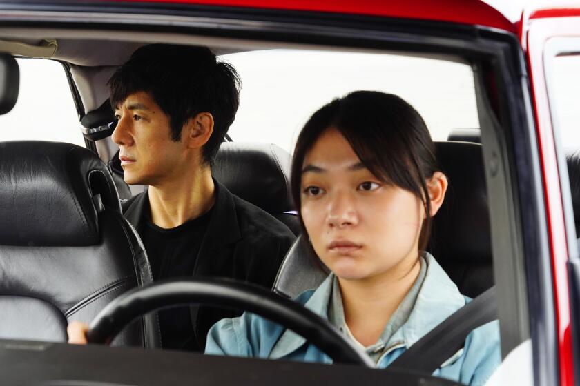 Hidetoshi Nishijima and T?ko Miura in the movie "Drive My Car."