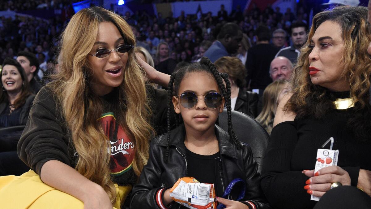 Blue Ivy Carter with her mother, Beyoncé, and grandmother, Tina Knowles.