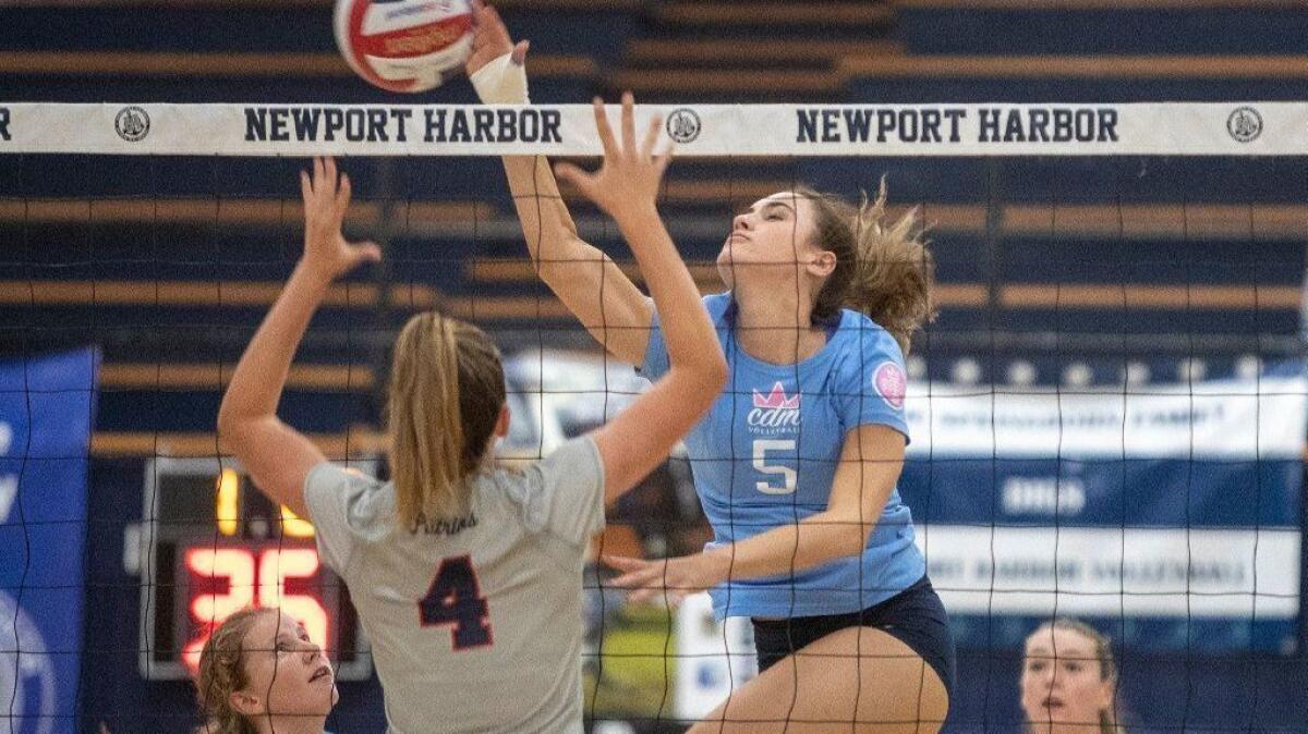 Corona del Mar High's Karly Recker, seen hitting the ball on Sept. 1, and hopes to extend the Sea Kings' winning streak to 12 matches when they host Edison on Tuesday.