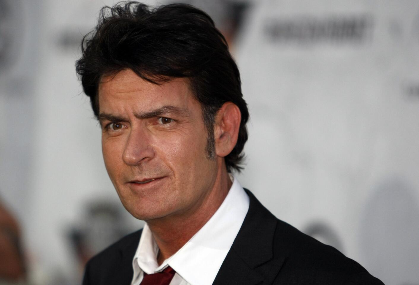 Charlie Sheen gives it to Rihanna on Twitter