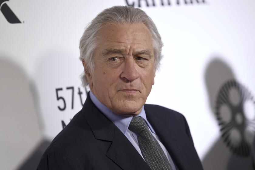 FILE - This Sept. 27, 2019 file photo shows Robert De Niro at the world premiere of "The Irishman" during the opening night of the 57th New York Film Festival in New York. De Niro is being sued by his former assistant who claims he subjected her to sexist and harassing comments. Chase Robinson sued the 76-year-old De Niro Thursday, Oct. 3, in Manhattan federal court, seeking $12 million. The lawsuit came six weeks after De Niro’s company, Canal Productions, sought $6 million from Robinson in state court, accusing her of misappropriating money. (Photo by Evan Agostini/Invision/AP, File)