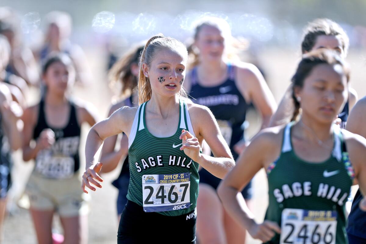 Sage Hill's Kate Miller competes in the CIF Southern Section Division 5 finals at the Riverside City Cross-Country Course on Nov. 23.