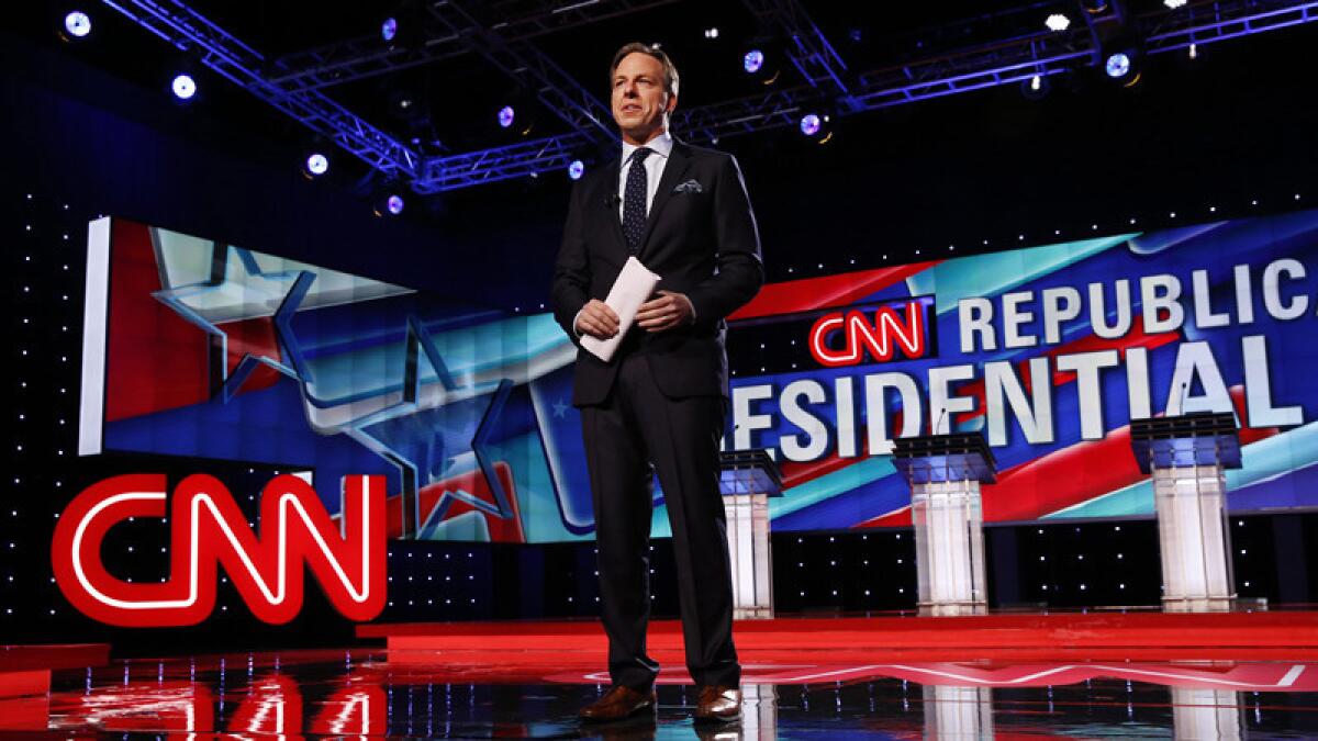 Jake Tapper moderates the Republican primary debate hosted by CNN, the University of Florida and the Washington Times.