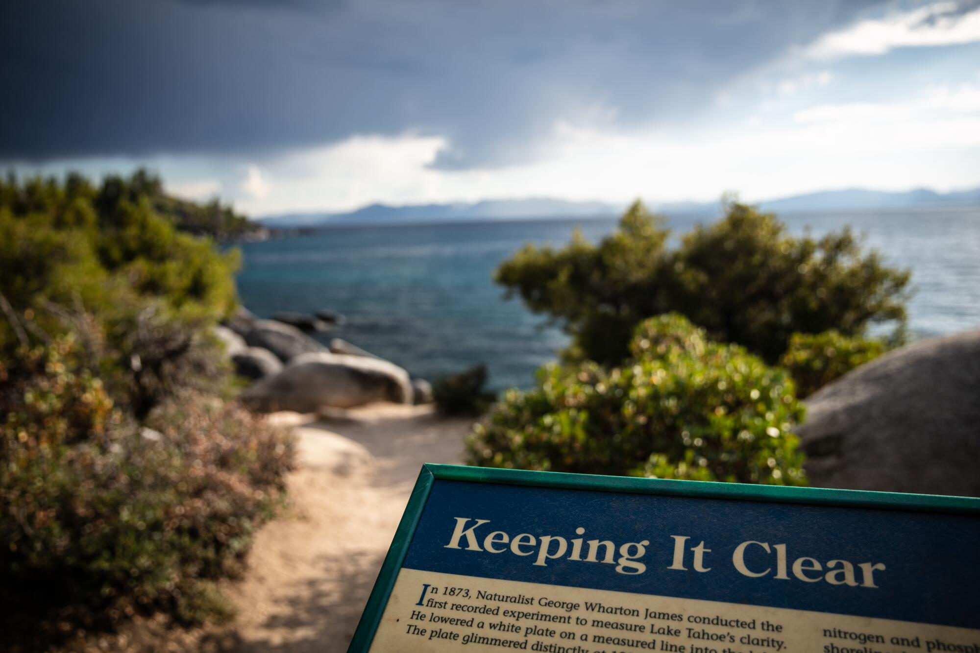 A sign educates visitors about Lake Tahoe's famed clarity on the shoreline near Sand Harbor, Nev.